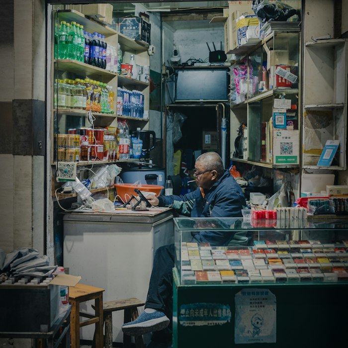 Older man in his convenience store