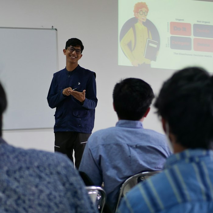 Man stands in front of a group